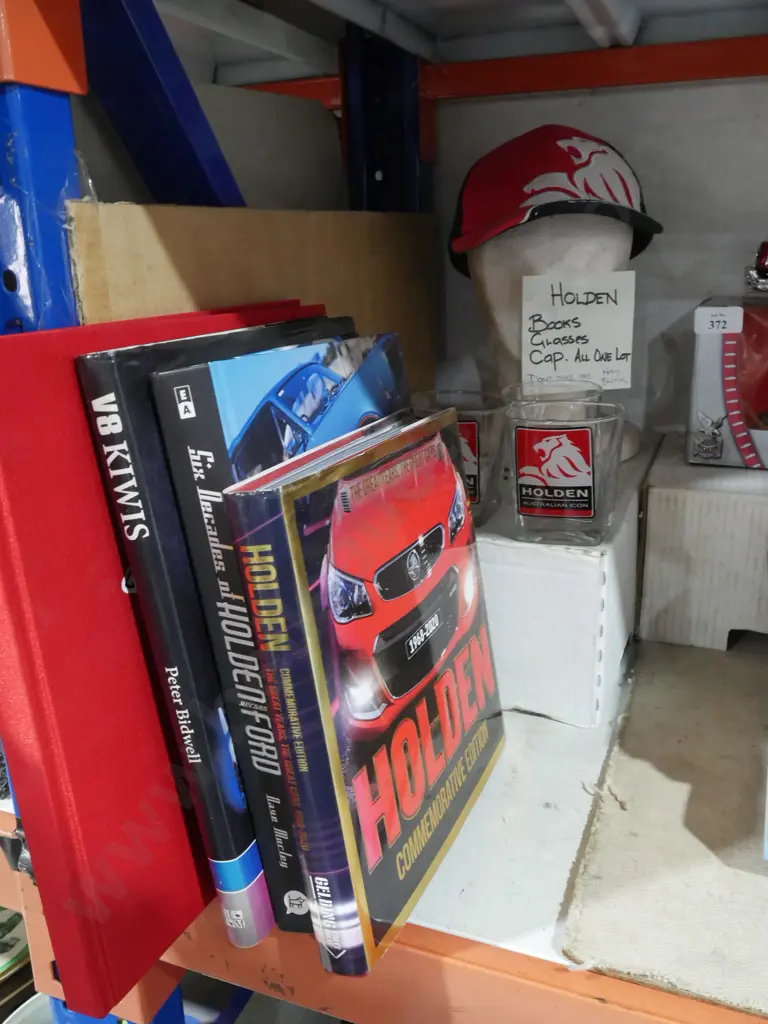 Holden books, glasses and hat Image 1++