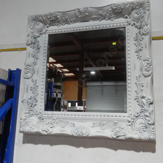 Bevilled edge framed mirror
