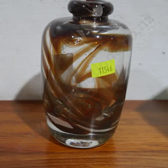 Glass bottle signed