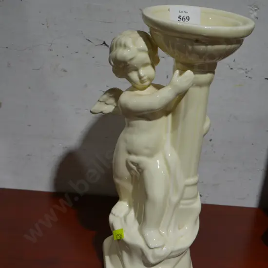 Porcelain cherub candle holder