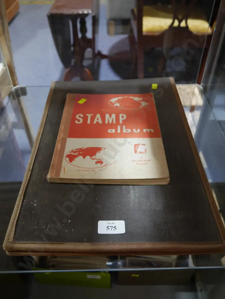 Stamp album & sheet of stamps Image 1++