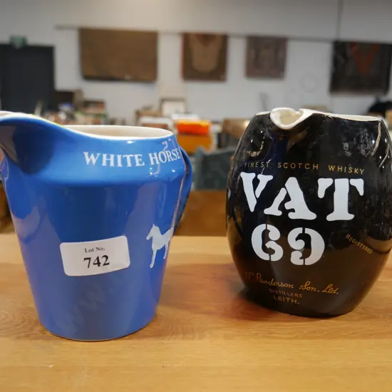 2 whiskey jugs