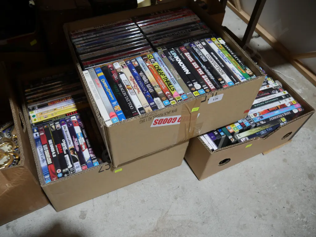 3 boxes of dvds Image 1++