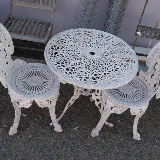 White metal table and 2 chairs