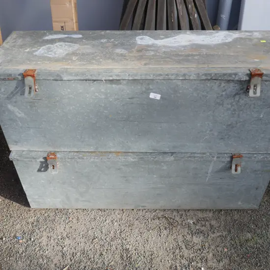 2 tin trunks