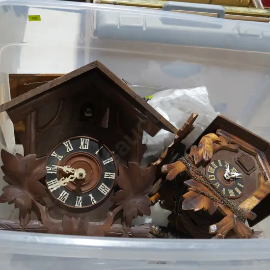 Two cuckoo clocks
