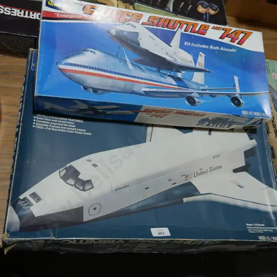 Two kitset model space shuttles