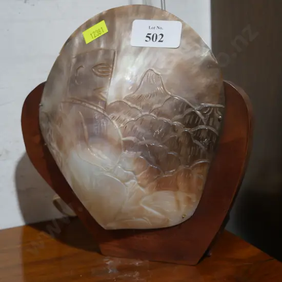 Carved shell lamp
