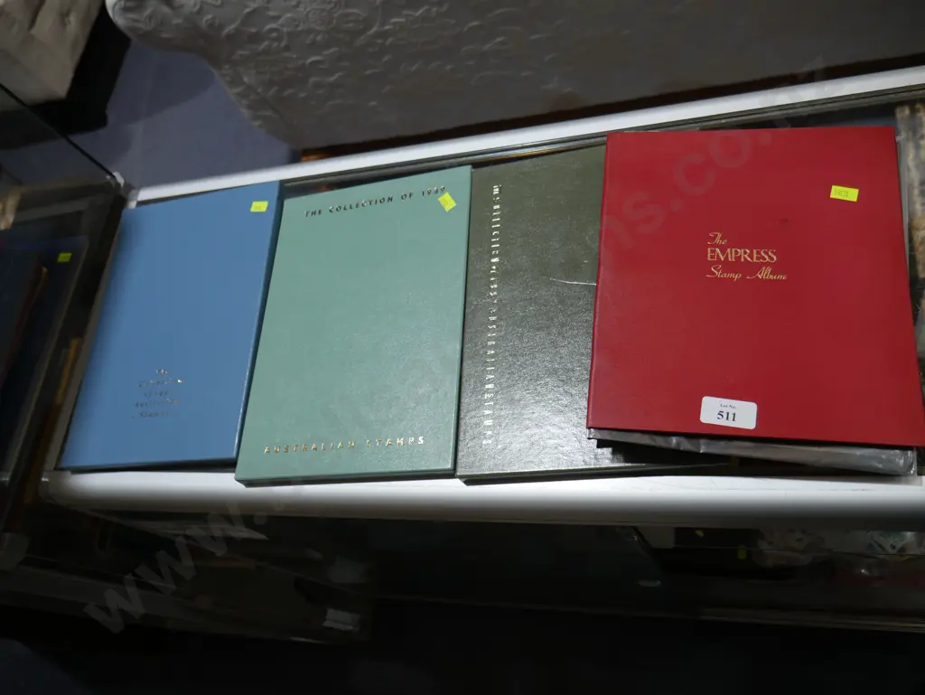 4 stamp albums Image 1++