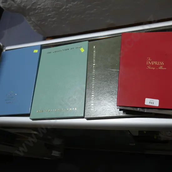 4 stamp albums