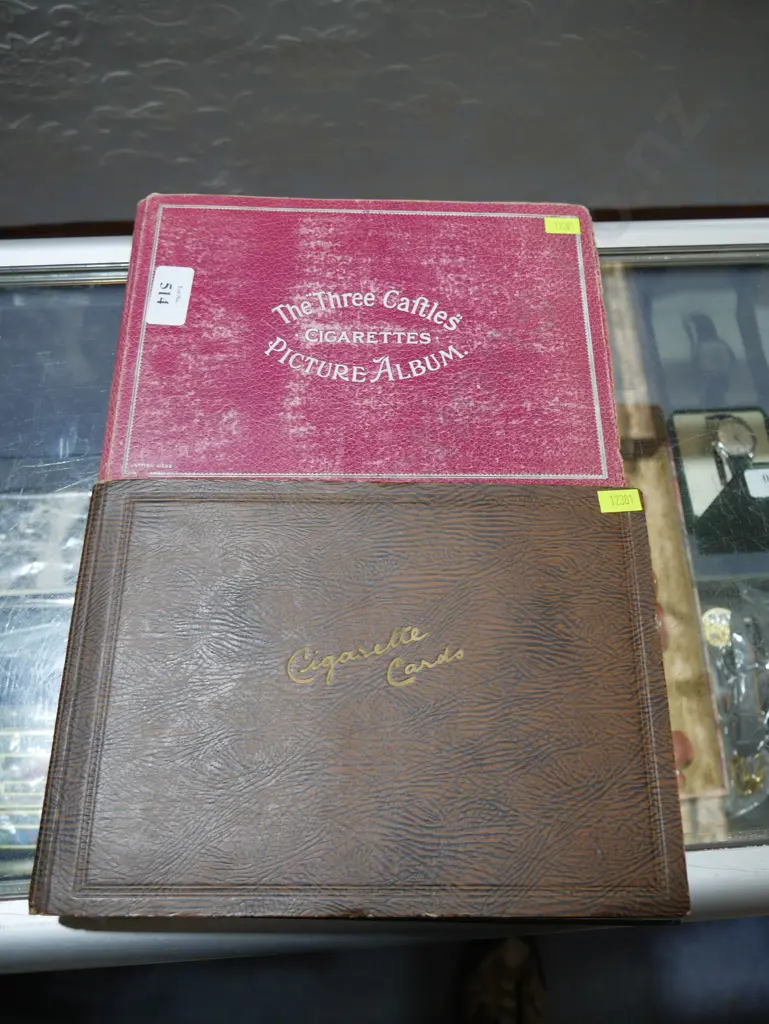 Two cigarette card albums Image 1++