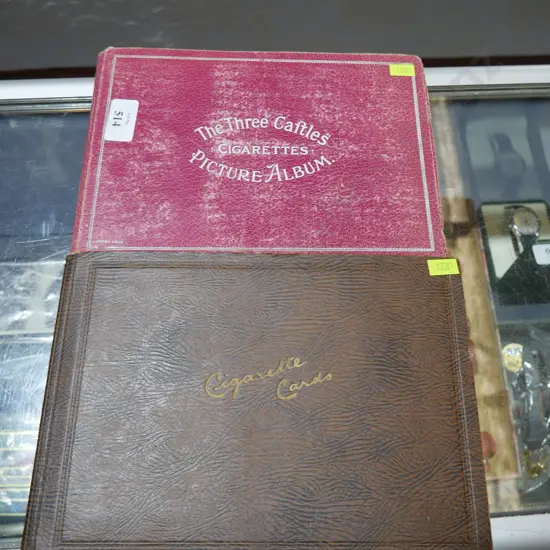 Two cigarette card albums