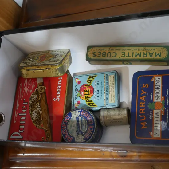 Assorted tins