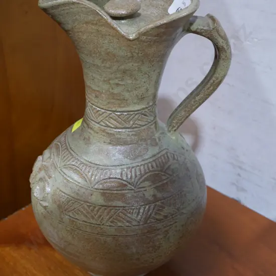 Pottery lidded jug