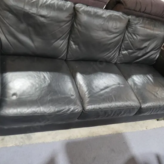 Leather three seater settee