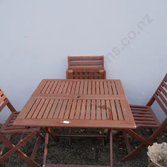 Wooden folding table and three chairs