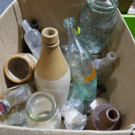 Glass and stone bottles and jars