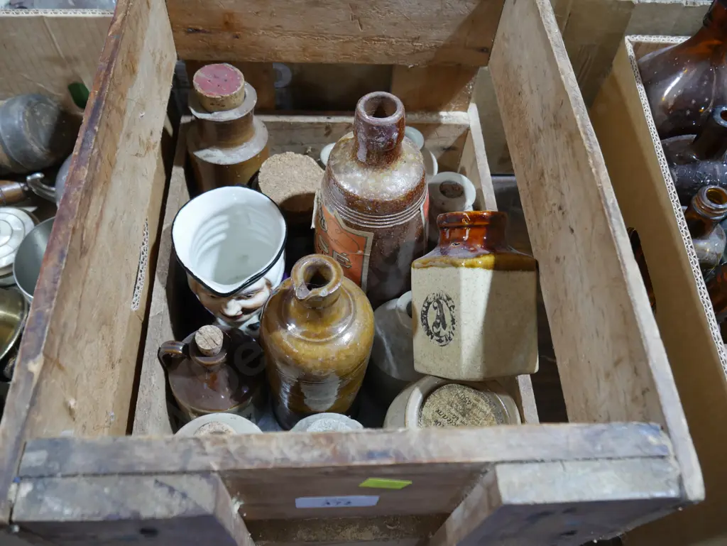 Crate of stoneware bottles Image 1++