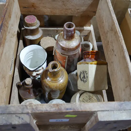 Crate of stoneware bottles