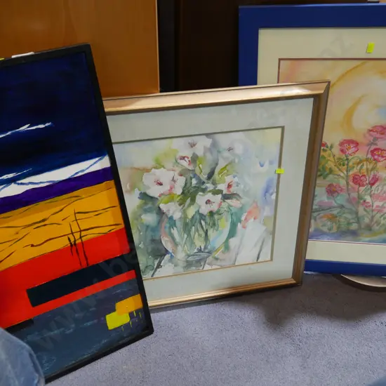 Three framed artworks