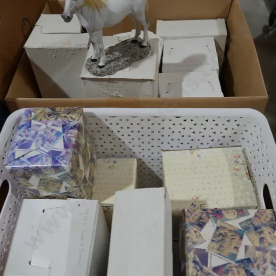 Two boxes of boxed ornamental items