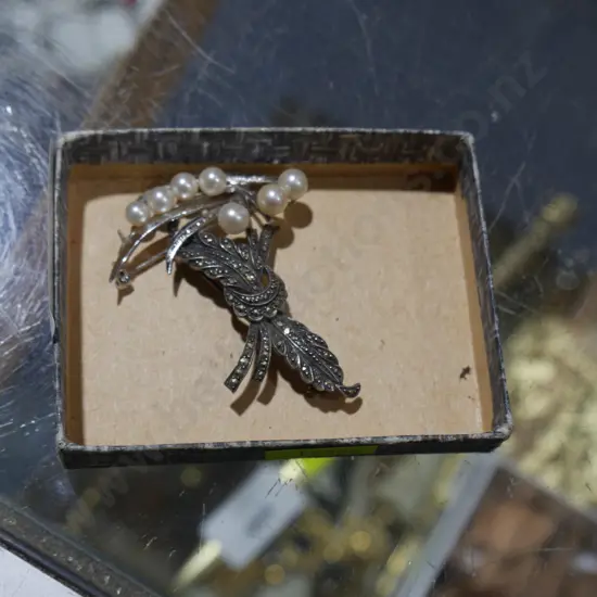 2 silver brooches