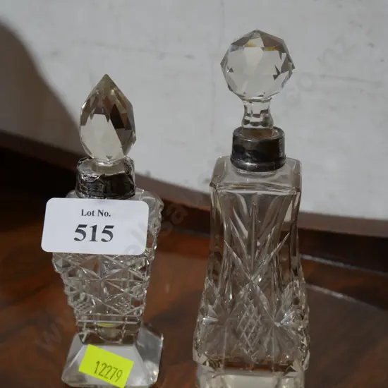 Two cut Crystal with Stirling collar scent bottles