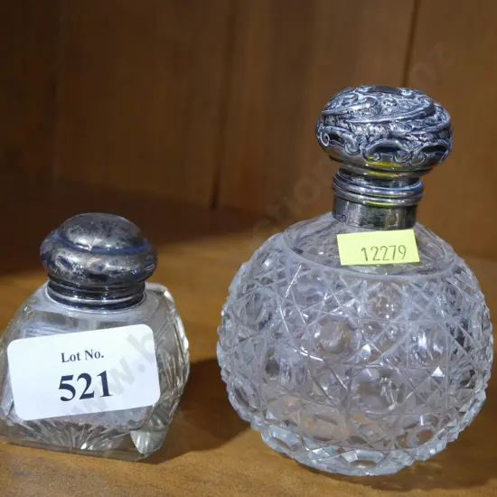2 cut Crystal with sterling silver top sent bottles