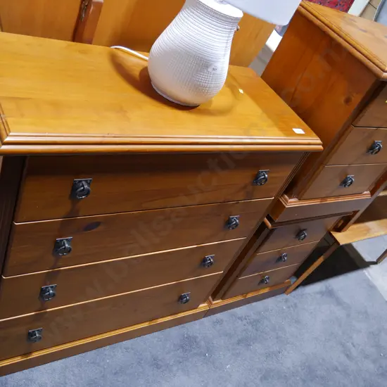 Two bedside drawers and tall boy