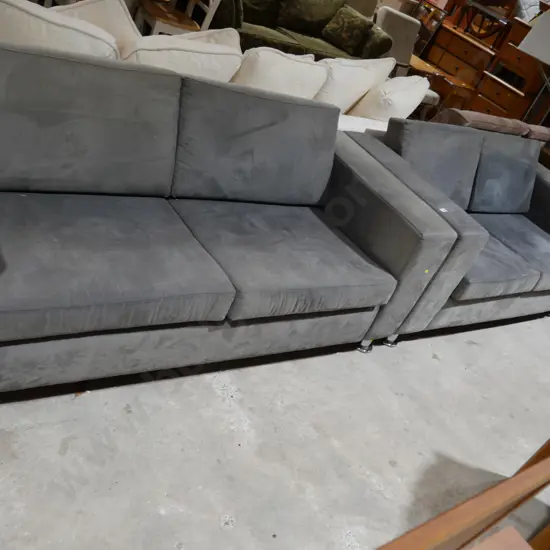 Two grey sofas