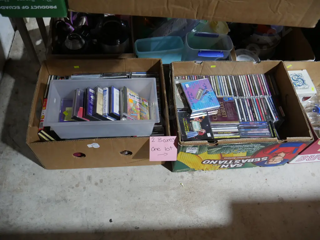 Two boxes of CDs Image 1++