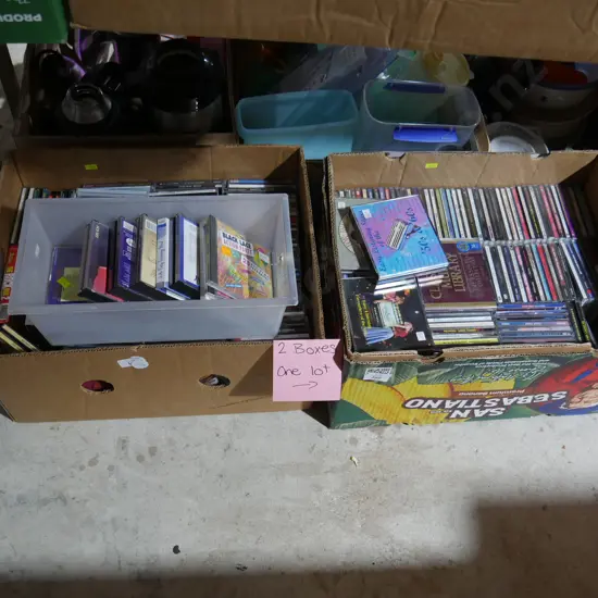 Two boxes of CDs