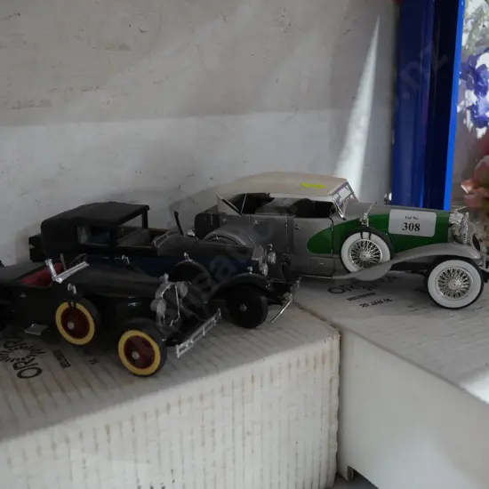 Three model cars