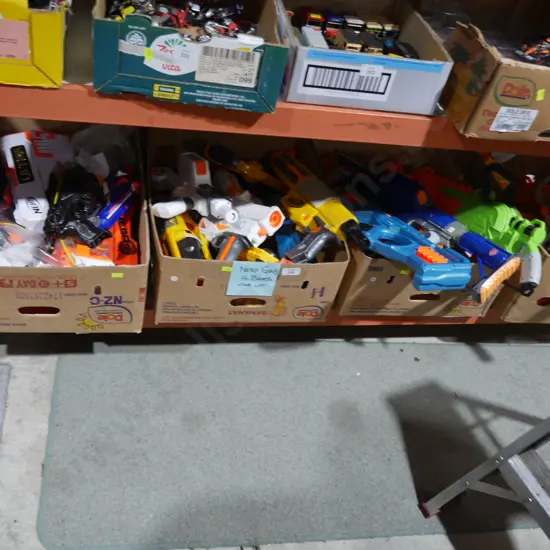 Four boxes of assorted nerf guns