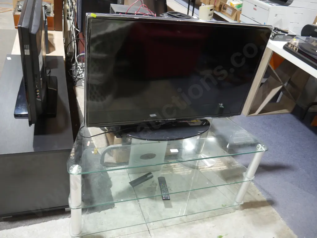 Samsung 40 inch TV and glass stand Image 1++
