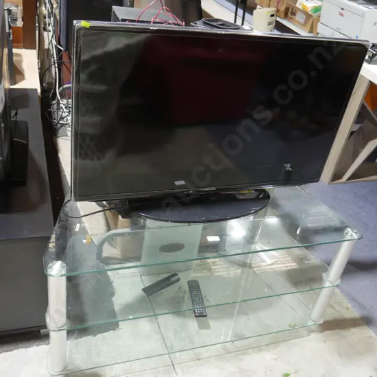 Samsung 40 inch TV and glass stand