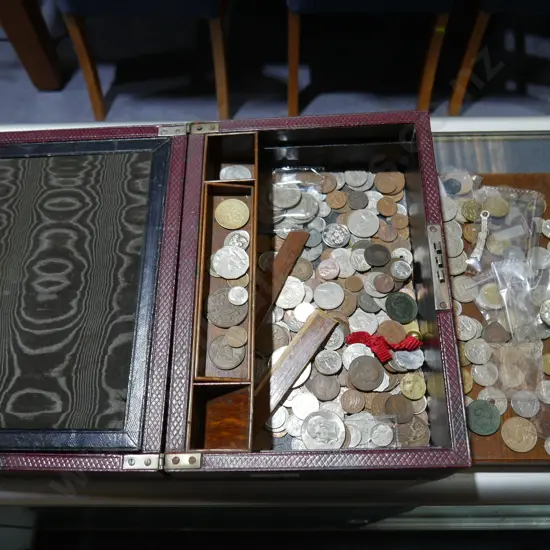 Assorted coins and writing box
