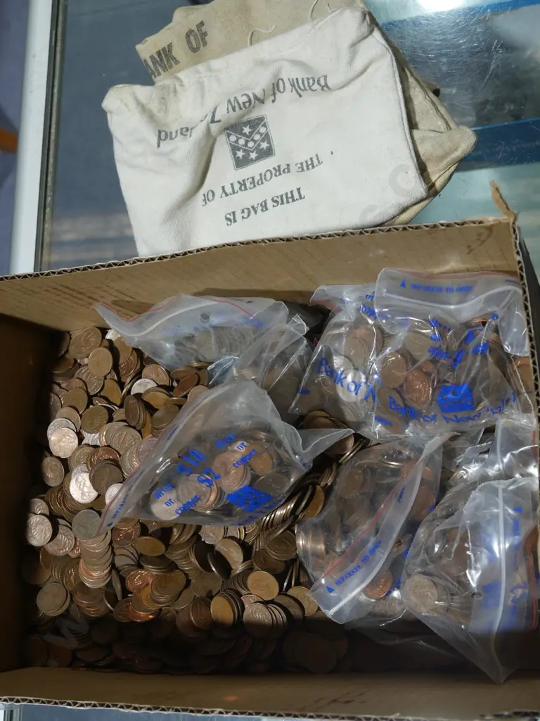 Box of assorted coins Image 1++