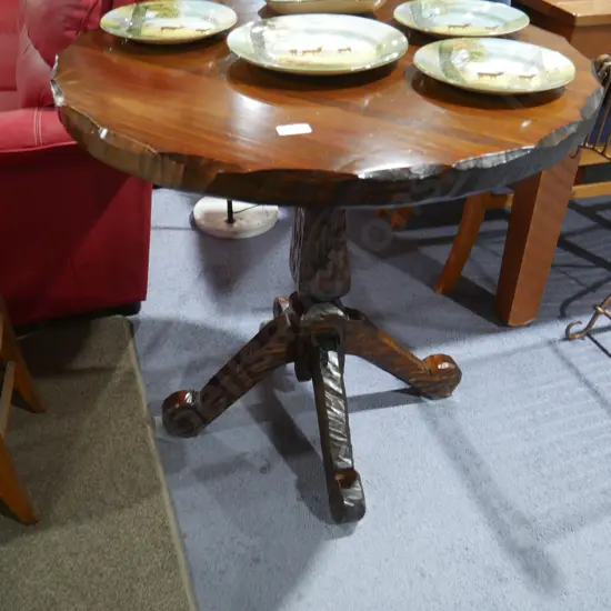 Carved occasional table