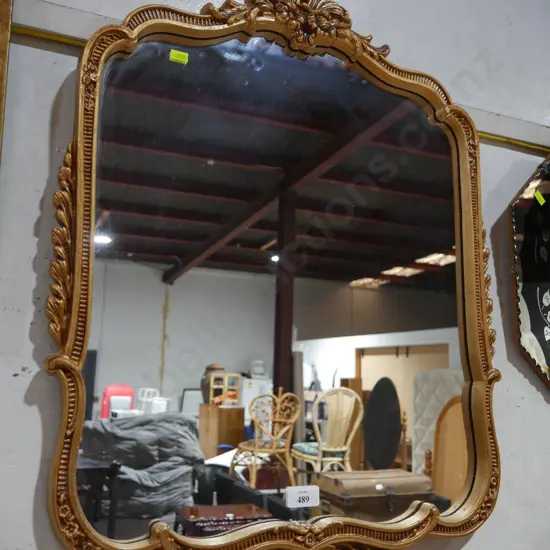 Gold-framed mirror