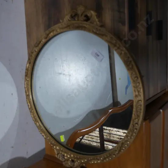 Round gilt frame mirror