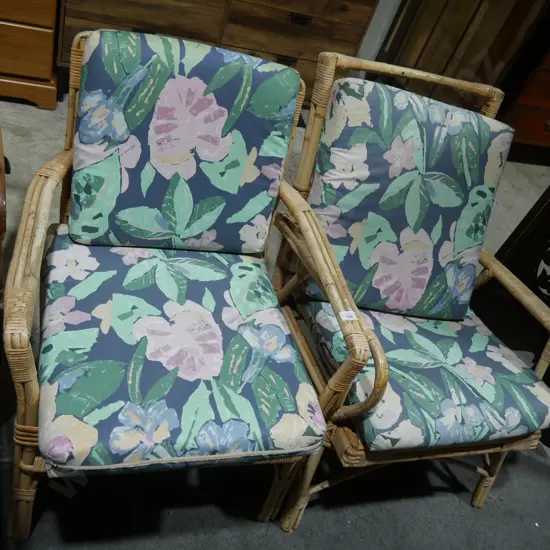 Two cane armchairs