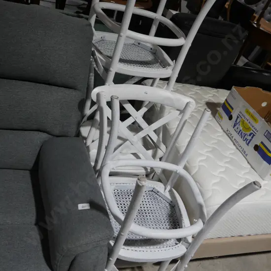 Four dining chairs