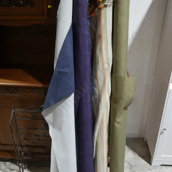 4 rolls of material