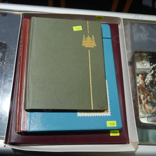 3 stamp albums