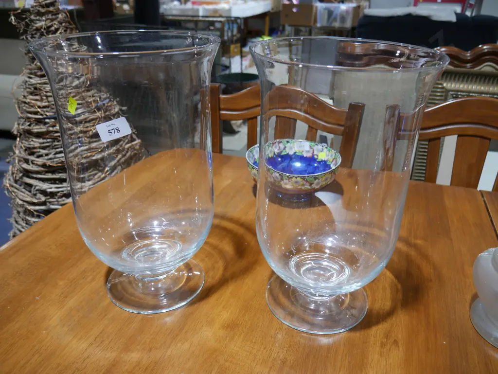 A pair of large glass candle holders Image 1++