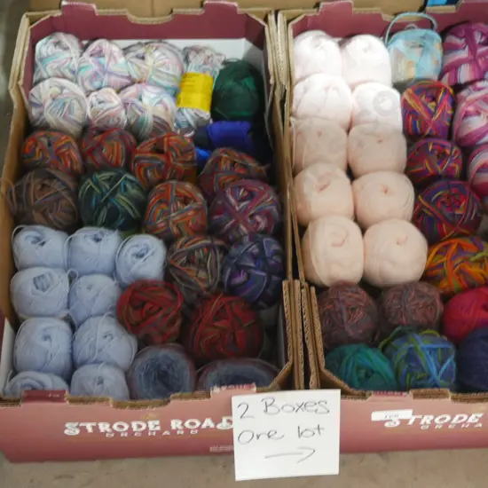 Two boxes of knitting wool