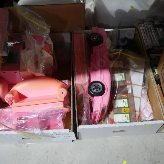 Two boxes of Barbie toys