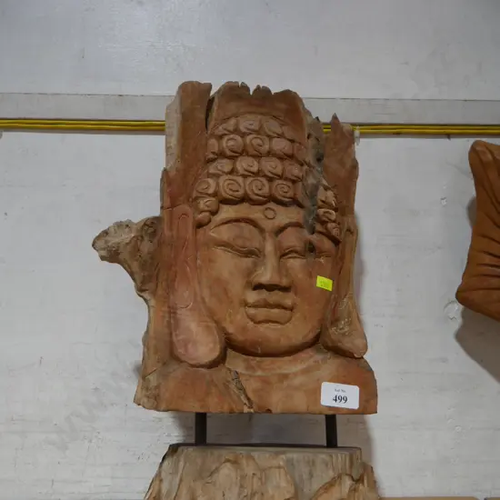 Wooden Buddha head sculpture
