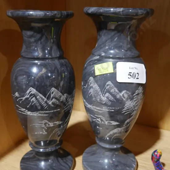 Pair of etched marble urn vases